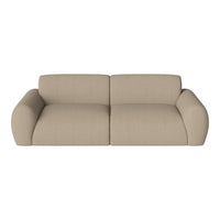 Beige sofa with a soft, textured fabric and rounded seams, ideal for cozy and modern living spaces.