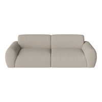 Beige modern sofa with smooth fabric and curved armrests, adding a minimalist touch to any living space.