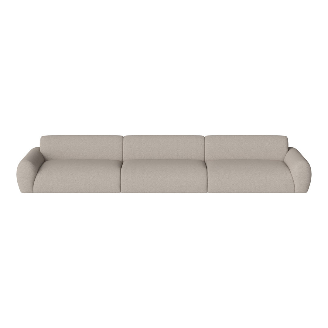Beige textured sofa with smooth, rounded edges and a minimalist design, ideal for modern interiors.