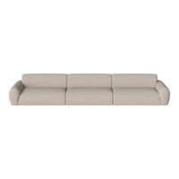 Beige fabric sofa with a smooth texture and minimalist design, featuring soft curves and a seamless appearance.