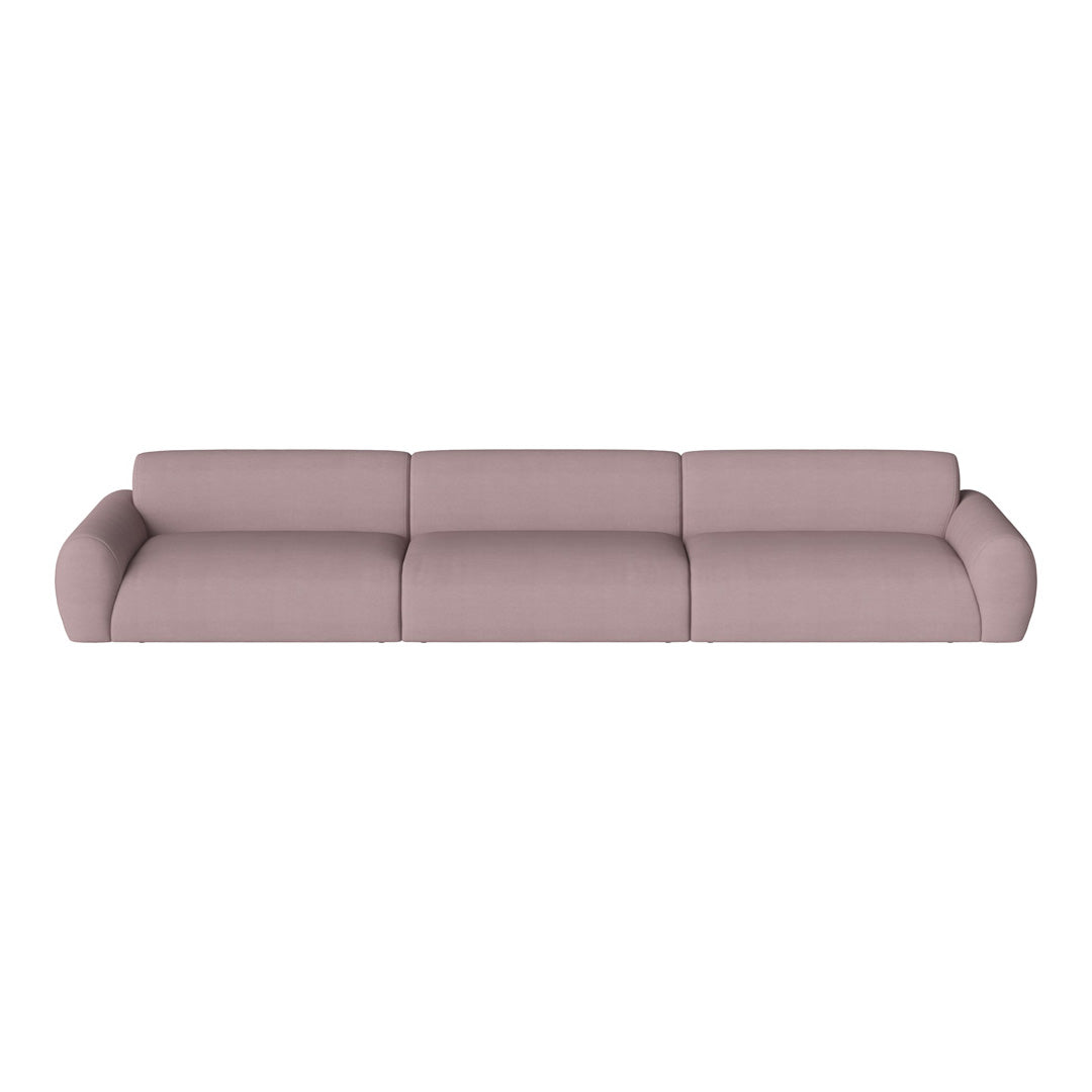 Muted pink three-seater sofa with smooth fabric and rounded edges, ideal for modern living spaces.