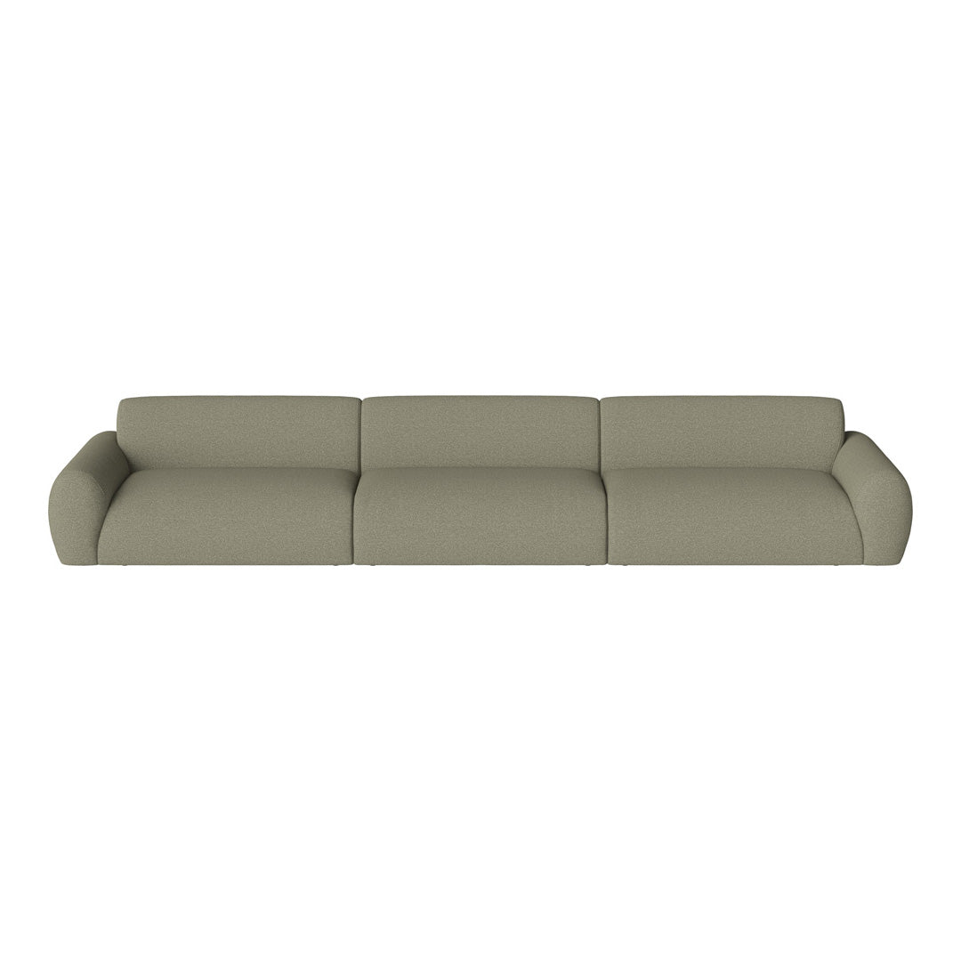 Light olive green sectional sofa with a smooth, textured fabric and plush contours, perfect for modern living spaces.