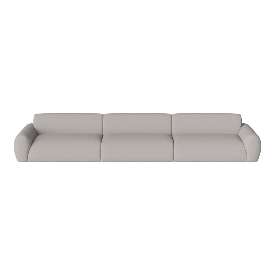 Light gray minimalist sofa with smooth, soft fabric and streamlined design for a modern aesthetic.