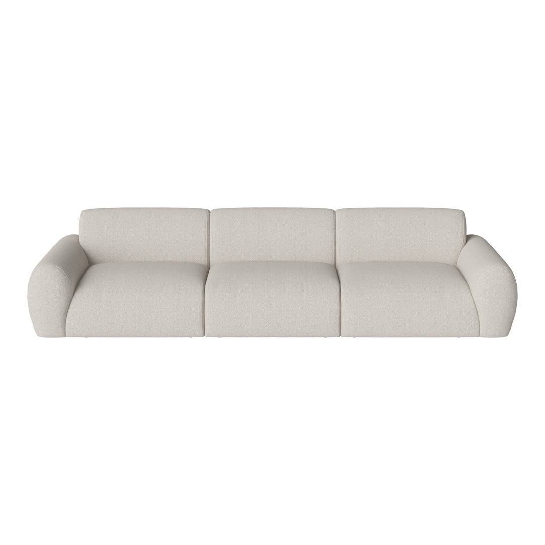 Light beige sofa with smooth texture and minimalist design, featuring clean lines and a modern aesthetic.