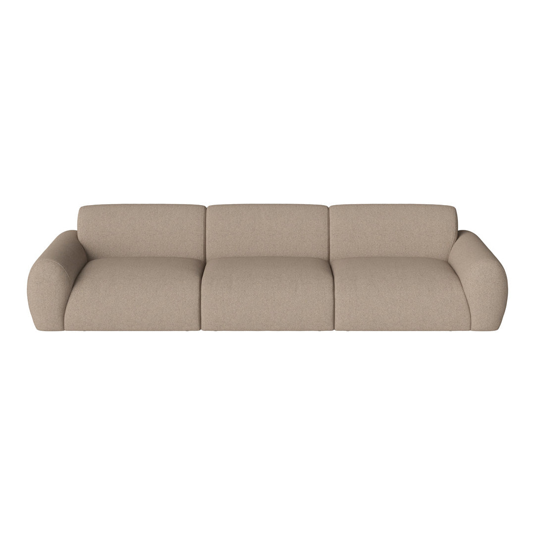 Beige upholstered sofa with soft, textured fabric and seamless cushion design for a modern look.