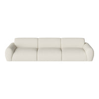 Soft cream sectional sofa with a smooth, textured fabric and minimalist design, perfect for modern interiors.