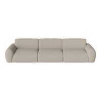 Beige modular sofa with smooth, contemporary lines and soft upholstery, perfect for modern living spaces.