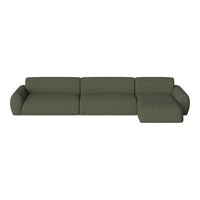 Dark green, textured fabric sectional sofa with modern design and curved armrests against a white background.