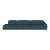 Teal modular sofa with a smooth texture and minimalist design, perfect for modern living spaces.