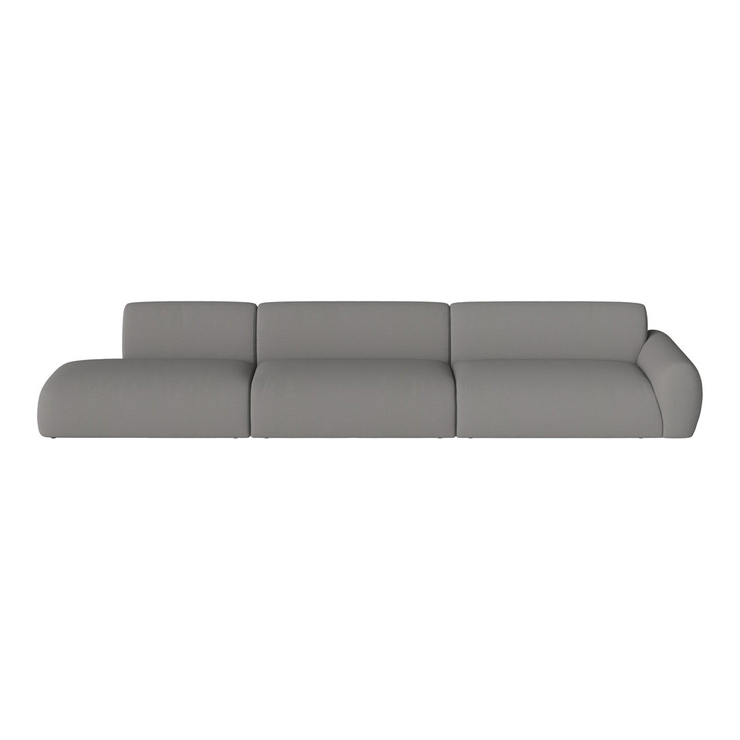 Modern gray sectional sofa with a sleek, minimalist design and smooth, textured upholstery. Perfect for any living space.