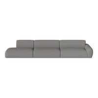 Modern gray sectional sofa with a sleek, minimalist design and smooth, textured upholstery. Perfect for any living space.