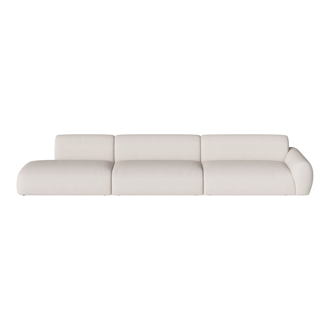 Modern white sectional sofa with smooth, minimalist design and soft fabric texture. Ideal for contemporary interiors.