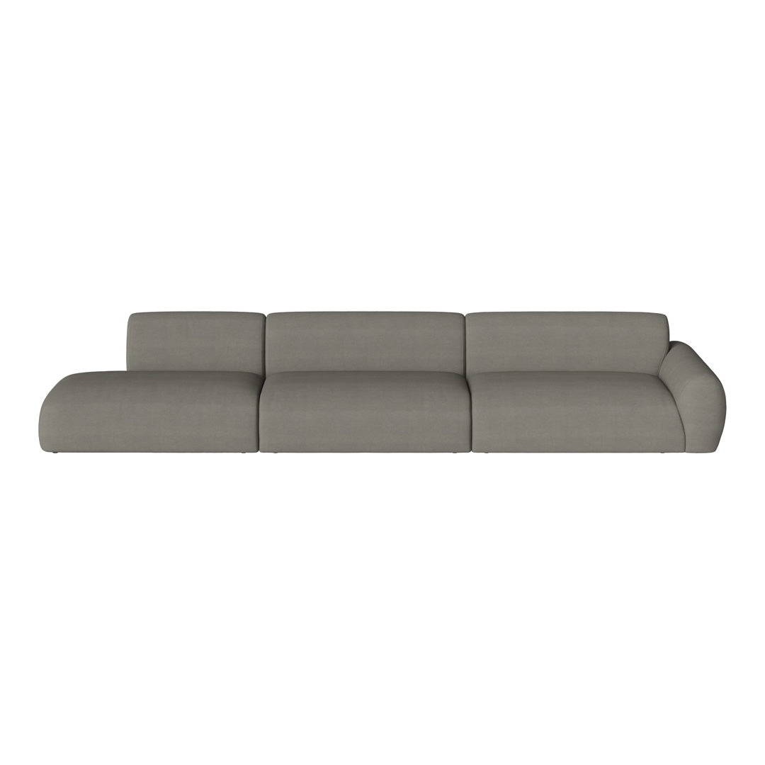 Contemporary grey sectional sofa with smooth, minimalist design and subtle textured fabric pattern.