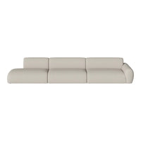 Beige sectional sofa with soft, textured upholstery and modern, rounded edges. Perfect for minimalist decor.