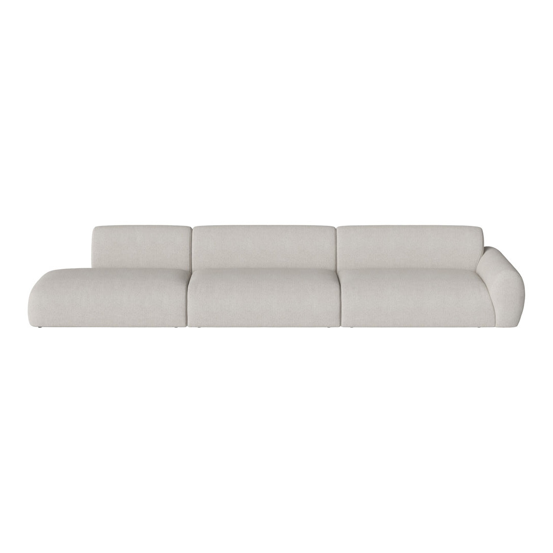 Light gray modern sectional sofa with a smooth, minimalist design and soft, textured fabric.