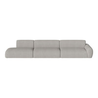 Light gray sectional sofa with a smooth, textured fabric and minimalist design, perfect for modern spaces.