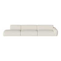 Modern white sectional sofa with smooth, minimalist lines and soft texture, ideal for contemporary decor.
