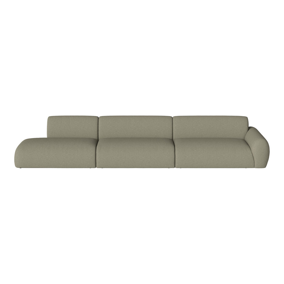 Sleek modern sofa in a soft olive green fabric, featuring smooth curves and a minimalist design.