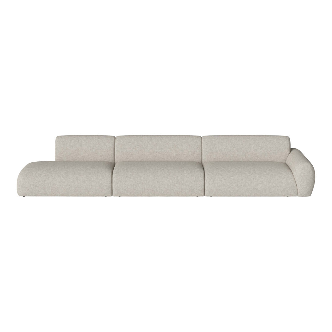 Light beige modular sofa with a smooth, understated texture and subtle, versatile pattern. Perfect for modern living spaces.