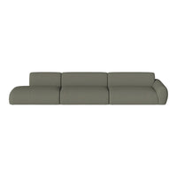 Sleek, modern sofa in a muted olive green fabric with smooth, minimalist design and cozy, rounded edges.