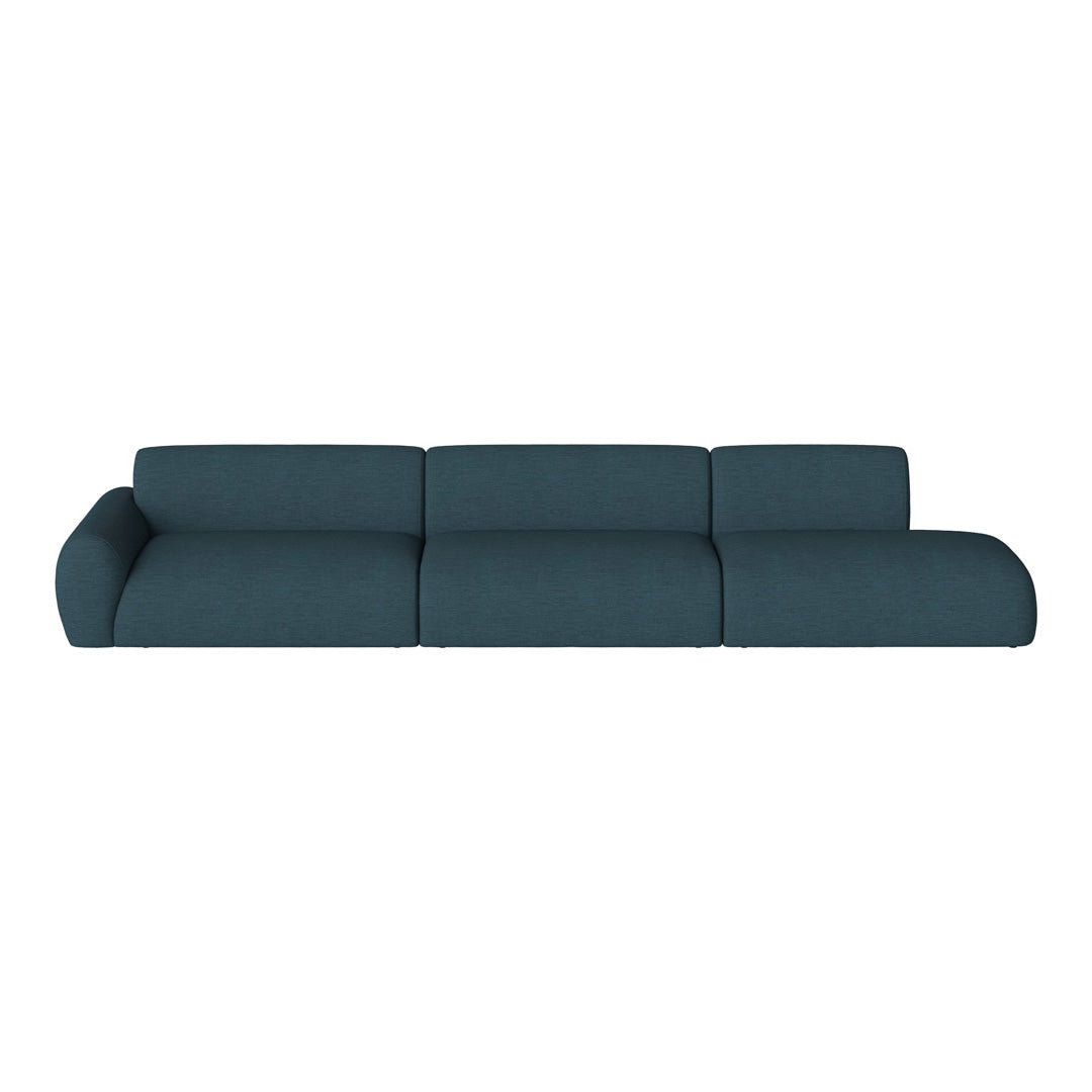 Teal modular sofa with a subtle textured pattern, featuring smooth lines and a contemporary design.