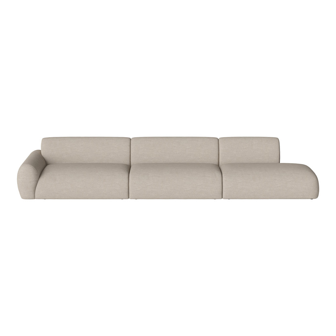 Beige sectional sofa with a minimalist design, featuring soft, textured fabric in a neutral color palette.