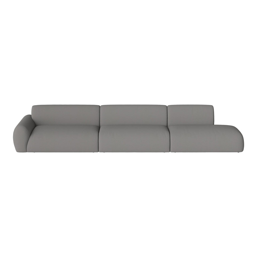 Modern modular sofa in soft grey fabric with smooth, clean lines and minimalistic design. Perfect for any living space.