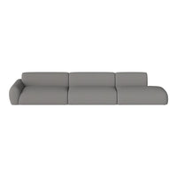 Modern modular sofa in soft grey fabric with smooth, clean lines and minimalistic design. Perfect for any living space.