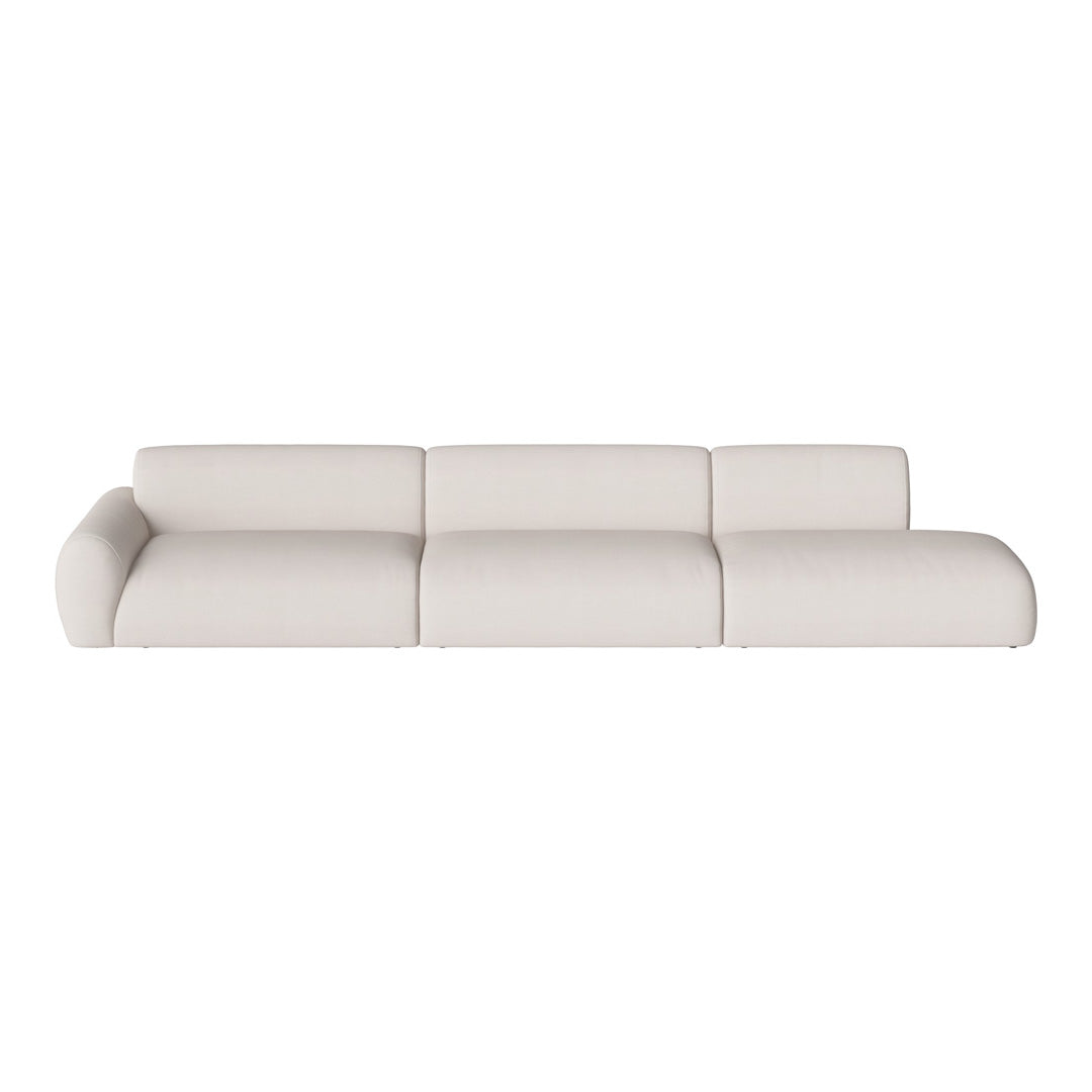 Elegant off-white sofa with smooth, minimalist design and soft, textured fabric. Perfect for modern decor.