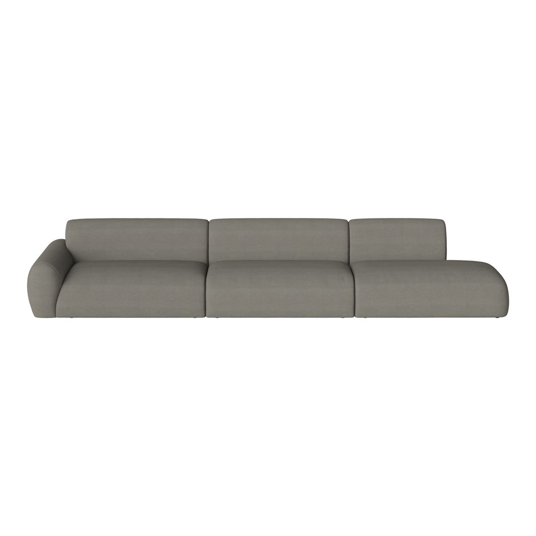 Sleek modular sofa in soft gray fabric, featuring smooth lines and minimalist design for modern interiors.