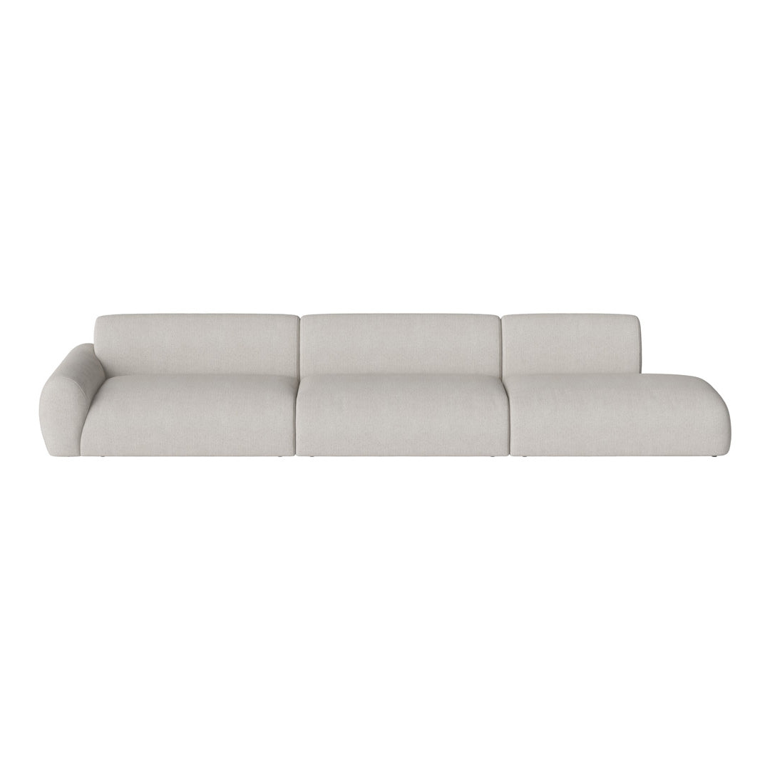 Light beige sectional sofa with a smooth, textured fabric and minimalistic design, perfect for modern interiors.