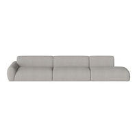Gray sectional sofa in a smooth, minimalist design with soft, textured fabric. Perfect for modern interiors.
