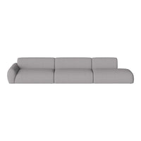 Gray sectional sofa with a modern, minimalist design and smooth textured fabric. Ideal for contemporary living spaces.