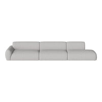 Light gray sectional sofa with a soft, textured fabric and modern, minimalist design. Perfect for any living space.