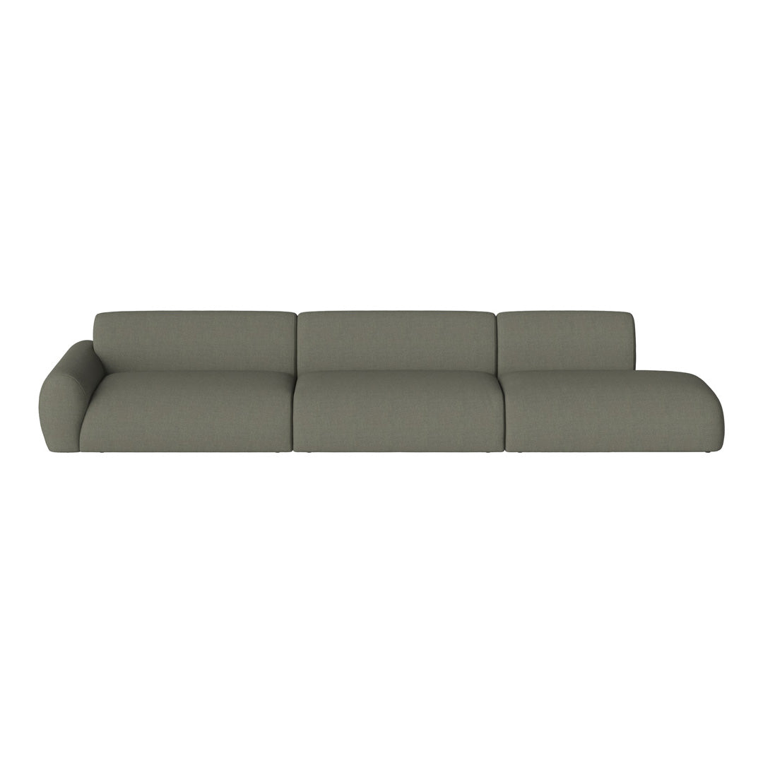 Modern gray sofa with smooth fabric and minimalist design, featuring soft curves and a chic, understated look.