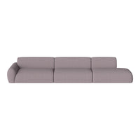 Stylish modern sofa in soft pastel lavender fabric with smooth, minimalistic design and no patterns.