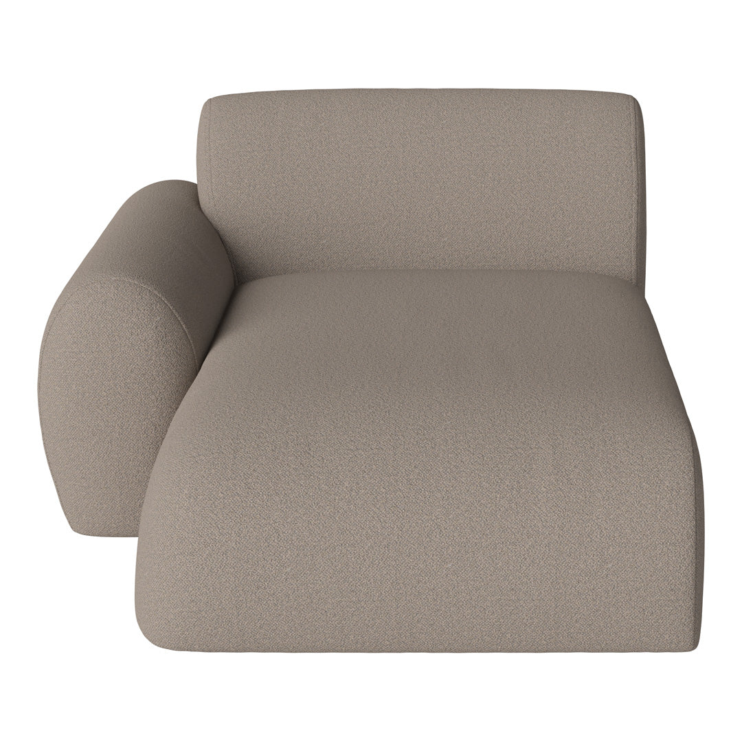 Beige textured upholstery with a soft, modern aesthetic, featuring a minimalistic design and rounded armrest.