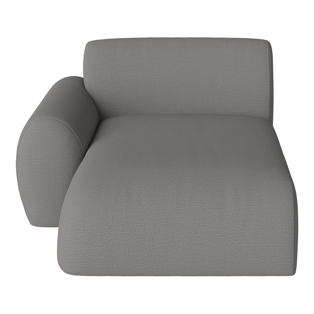 Gray upholstered chair with a smooth, textured finish and modern, minimalist design. Perfect for contemporary interiors.