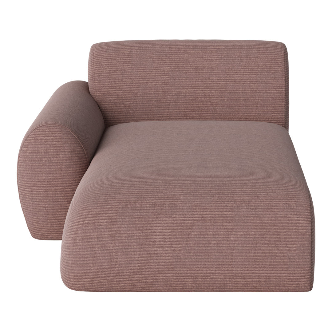 Textured pink chaise lounge with soft, muted tones and subtle stripes for a modern, cozy look.
