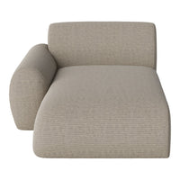 Beige striped chaise lounge with a smooth texture and rounded armrest, ideal for modern living spaces.