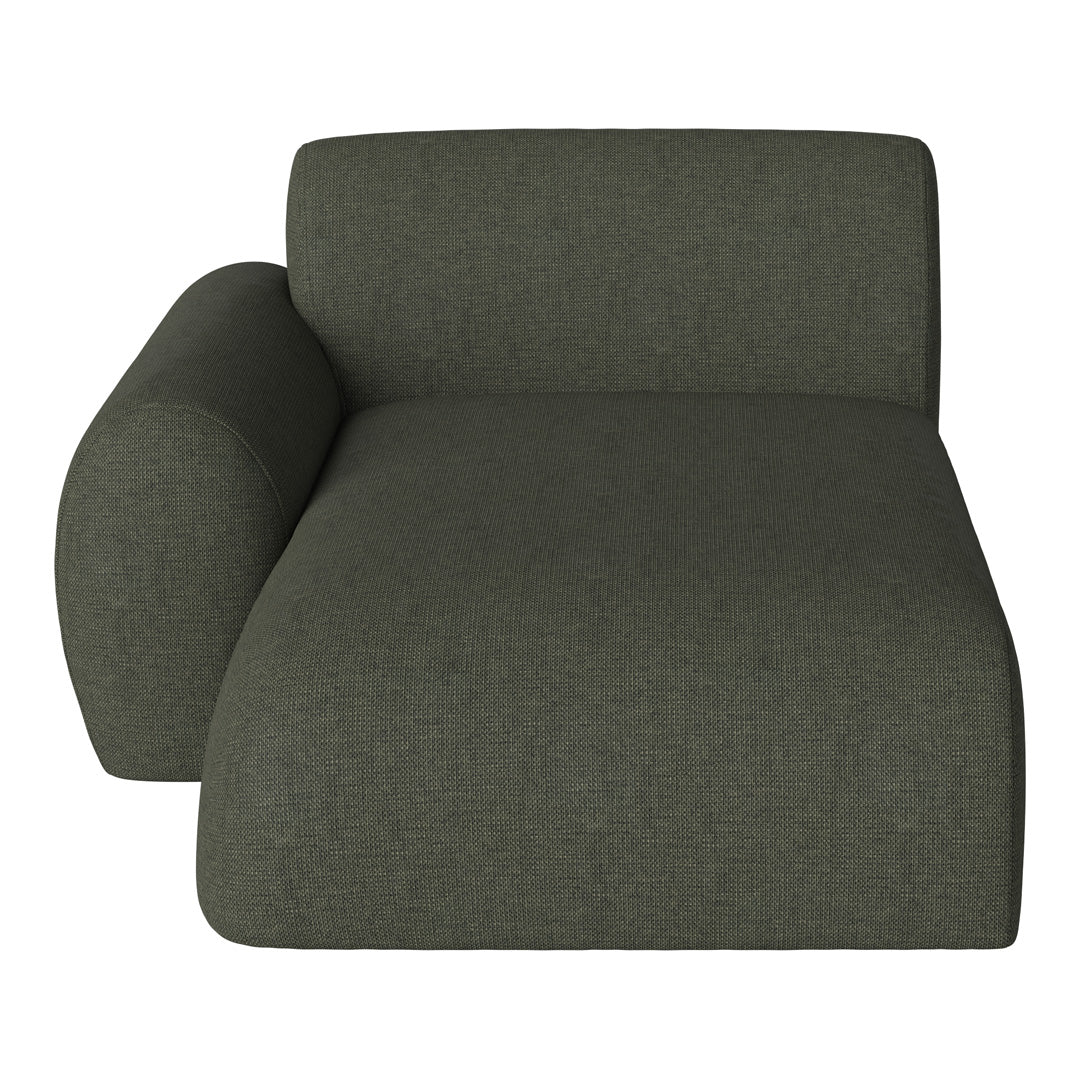Green textured chaise lounge with a modern, minimalist design. Soft, woven fabric enhances comfort and style.
