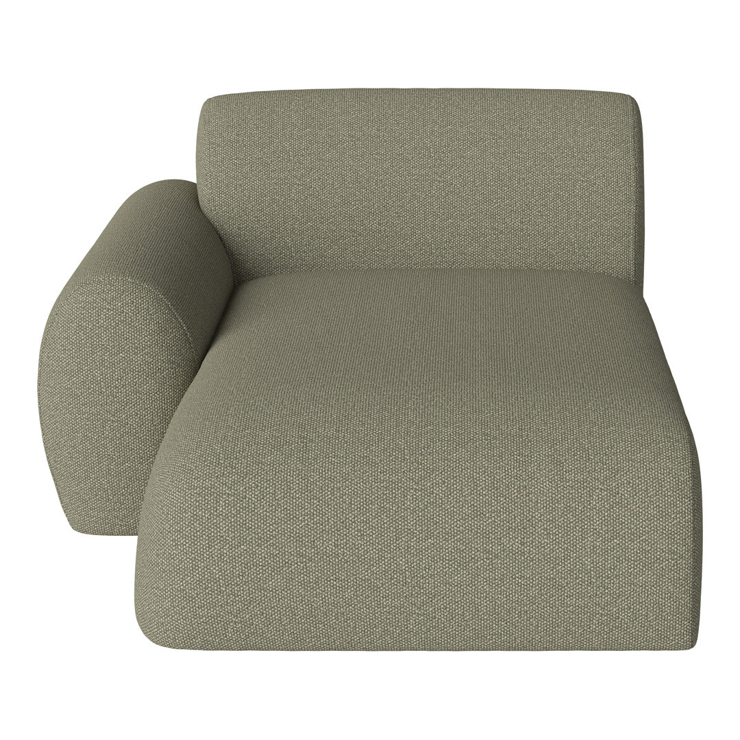 Light olive green chaise lounge with a textured, woven pattern for a modern, stylish look.