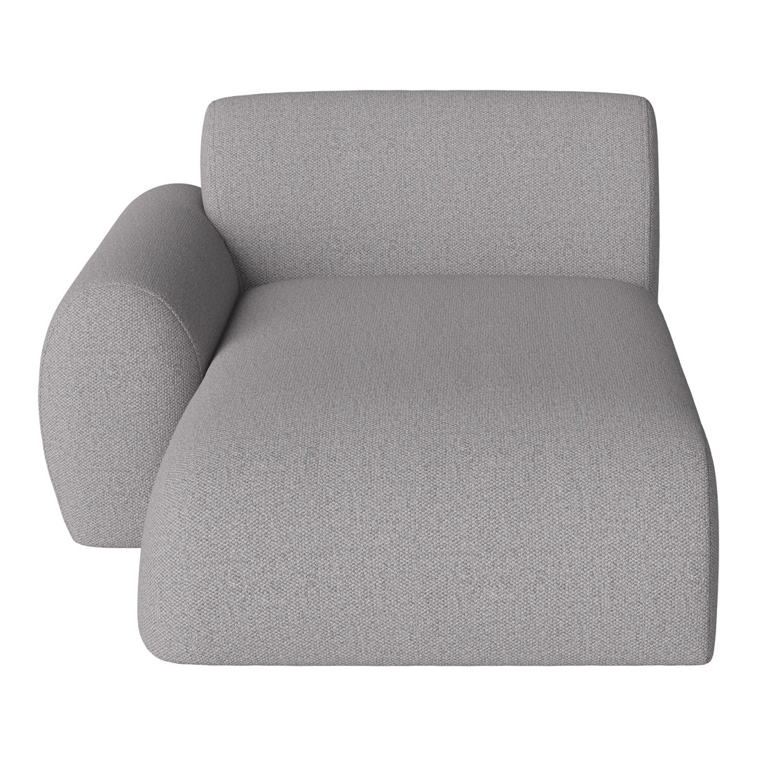 Modern light gray chaise lounge with a textured fabric pattern and minimalist design. Ideal for contemporary spaces.