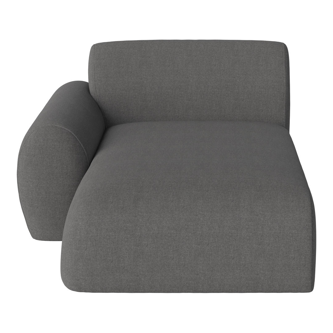 Minimalist gray upholstered chaise lounge with a smooth, textured finish and rounded armrest. Ideal for modern decor.