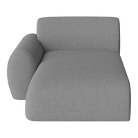 Gray fabric chaise lounge with a sleek, modern design and minimalistic curves, perfect for contemporary decor.