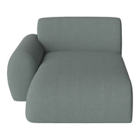 Soft green chaise lounge with a smooth, textured fabric and a contemporary design. Perfect for modern interiors.