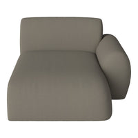Stylish chaise lounge in muted taupe fabric with a smooth texture and minimalist design.