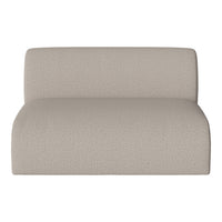 Light beige fabric upholstery with a subtle, textured pattern on a modern lounge chair.