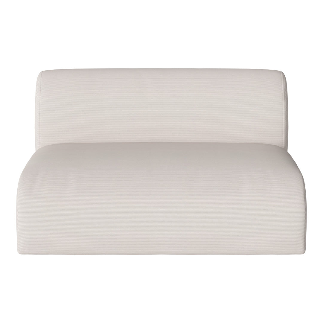 Light beige upholstered lounge chair with a soft, textured fabric and minimalist design.