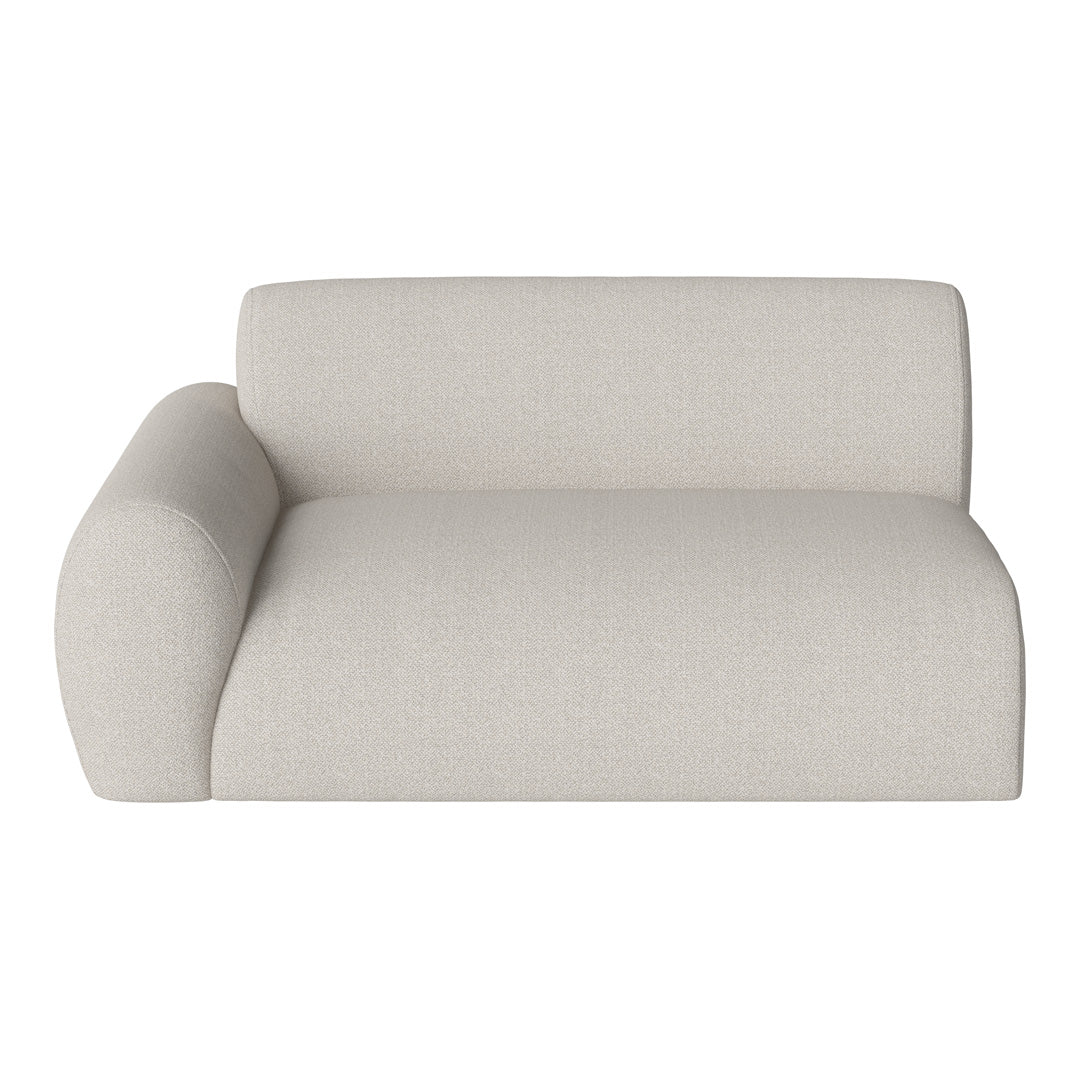 Light beige sofa featuring a smooth, textured fabric with minimalist design and rounded armrest.